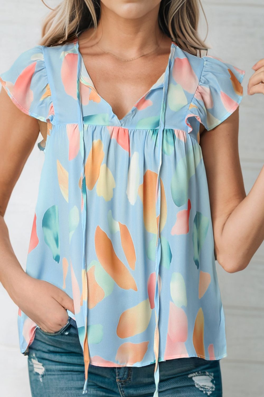 Abstract Print Blouse with Tie Neck and Flutter Short Sleeves