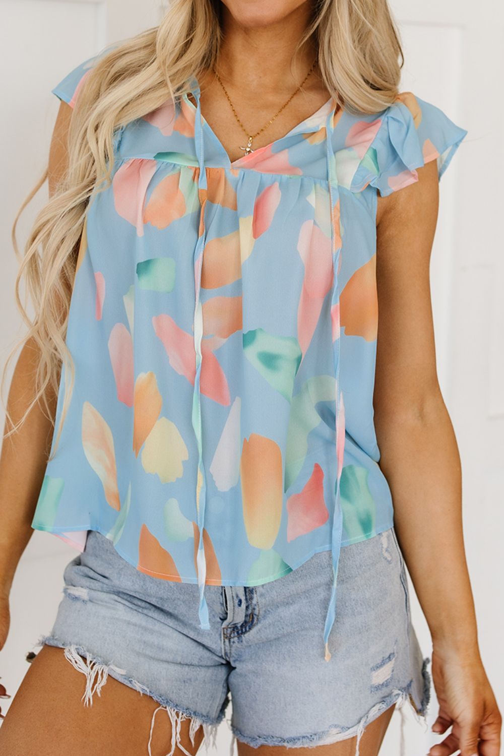 Abstract Print Blouse with Tie Neck and Flutter Short Sleeves