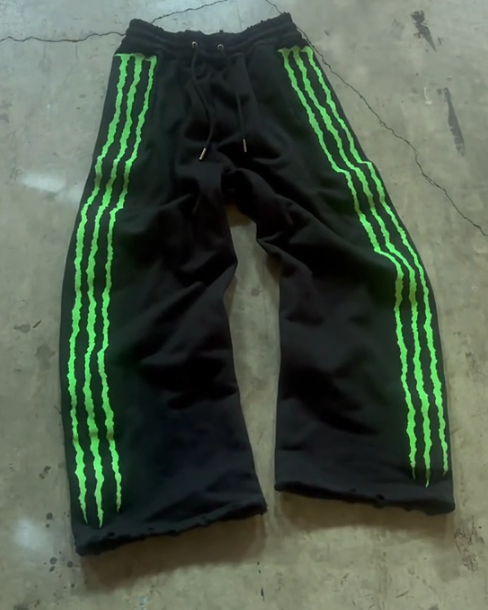 "Claw" glow-in-the-dark striped sweatpants