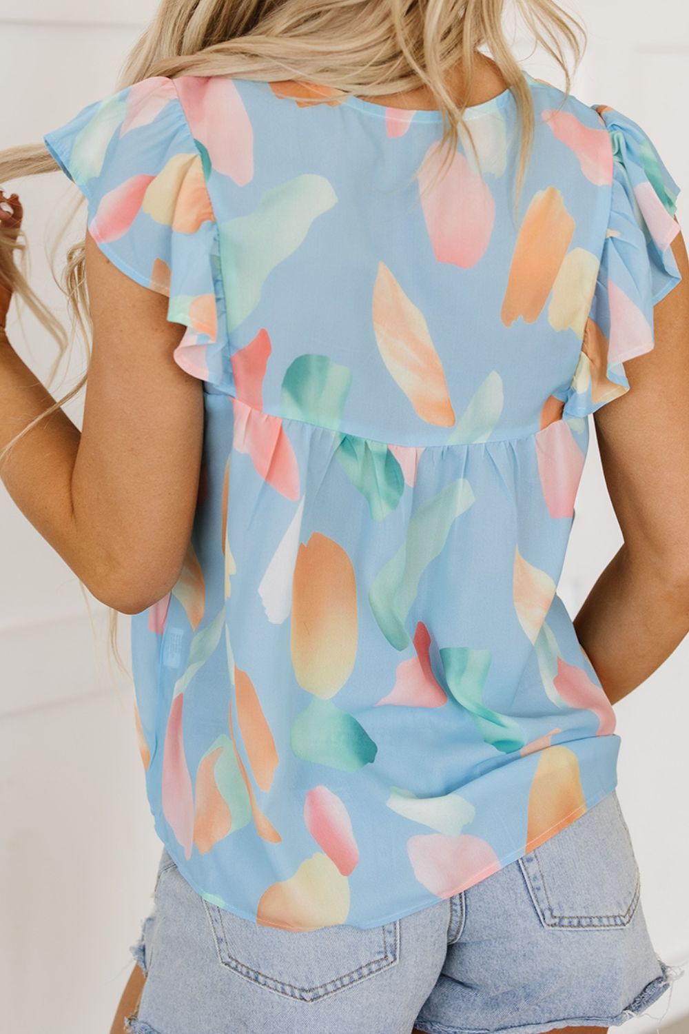 Abstract Print Blouse with Tie Neck and Flutter Short Sleeves